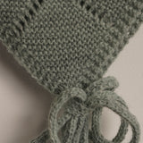Gorro bebé verde menta pompón natural