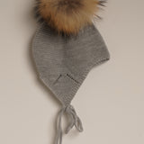 Gorro bebé gris pompón pelo natural