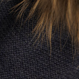 Gorro bebé azul marino pompón pelo natural