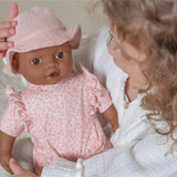 Ropita de muñeca rosa flores