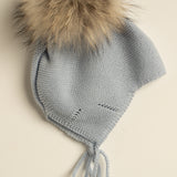 Gorro infantil premium lana merino azul pompón natural