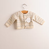 Chaqueta bebé punto greca pastel