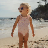 Bañador niña volante rosa conchitas Little Dutch