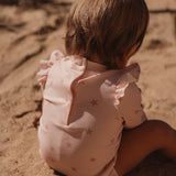 Bañador niña manga larga rosa conchitas Little Dutch