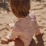 Bañador niña manga larga rosa conchitas Little Dutch